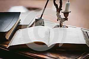 Old pharmacy prescription book on a dark wooden background.