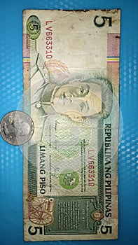 Old philippine five peso 1989 and old us coin dollar 1949