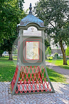 Old phone booth with the text national telephone in Swedish