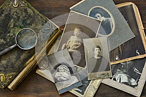 Old photo album and historical photos of family. photo