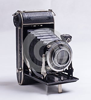 Old photo camera, analog with bellows and viewfinder photo