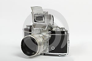 Old photo camera on white background