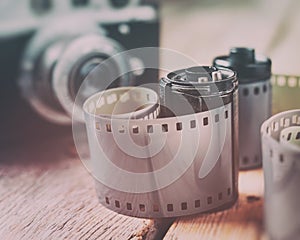 Old photo film rolls, cassette and retro camera