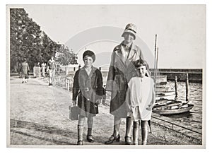 Old photo mother children on the sea Vintage picture