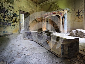 Old piano in an abandoned house