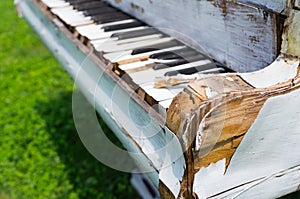 Old piano abandoned ouside