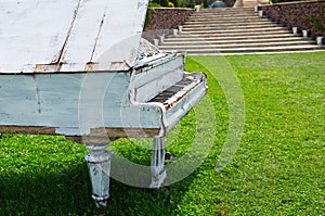 Old piano abandoned ouside