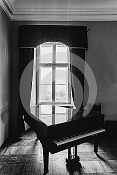 Old piano in a dark room