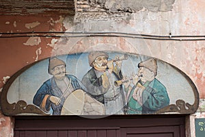 The old picture on the restaurant sign in center of Tbilisi city, Georgia