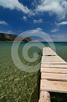 Old pier. Agios Konstantinos beach. Samos island. Greece