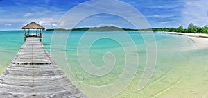 Old pier at a paradise beach in an island