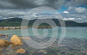 Old pier in the turquoise sea