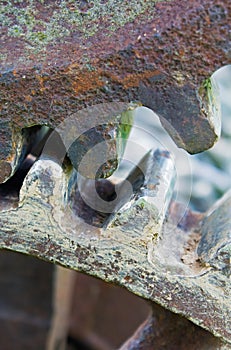 Old pinion gear of a mechanical machine