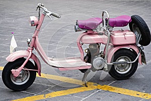 Old and pink motorbike