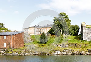 Old pinkish mansion on top of a hill