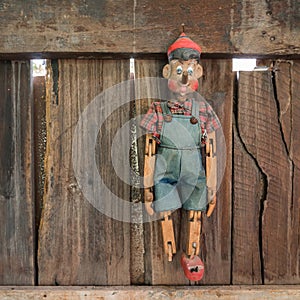Old Pinocchio wooden marionette