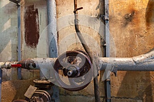 Old pipe valve on the heating system pipe