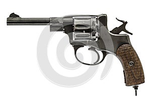 Old pistol with the hammer cocked, isolated on white background