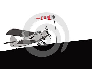 An old plane on the airfield is ready to fly.