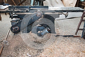 Old planing machine in the joinery workshop