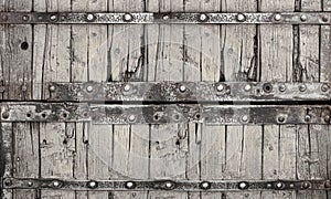 Old planks, rivets and rusty iron. Vintage background