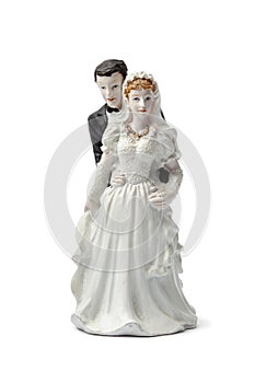 Old plaster bride and groom cake topper photo