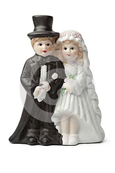 Old plaster bride and groom cake topper