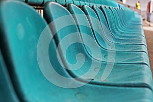 Old plastic seat in the stadium, background