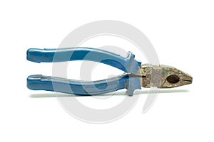 Old pliers in blue isolation
