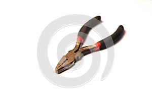 Old pliers on white background