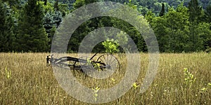 Old Antique Plow in Country Field