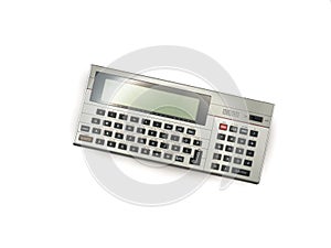 Old pocket computer from the 80s, old technology, mini pc. A silver calculator