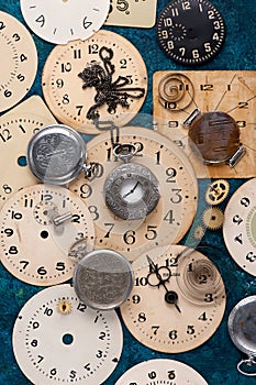 Old pocket watch and face old clock, vintage background