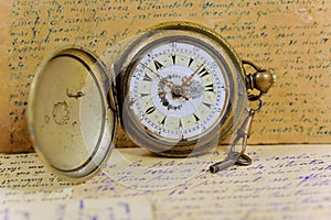 Old pocket watch with key
