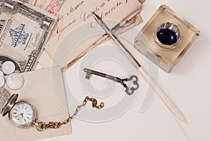 old pocket watch, old ink pen, handwrite letters