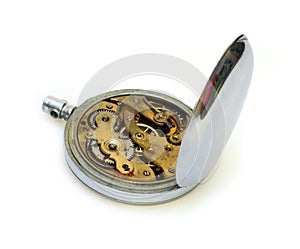 Old pocket watch with open cover of gear