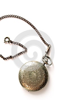 Old pocket watch on a white background