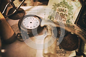 Old pocket watches, banknotes and coins of the Russian Empire, glasses in a case, silverware