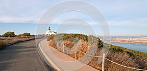 OLD POINT LOMA LIGHTHOUSE UNDER BLUE CIRRUS CLOUDSCAPE AT POINT LOMA SAN DIEGO SOUTHERN CALIFORNIA USA