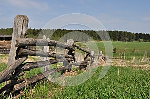 Old pole fence on outskirts