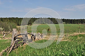 Old pole fence in village