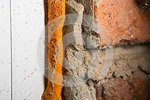 Old polyurethane foam close-up. Corrosion and destruction of building foam photo