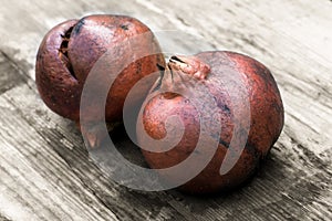 Old pomegranades on a table