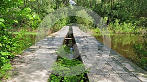 Old pontoon bridge across the river