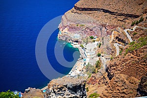 Old port below Thera on Santorini island photo