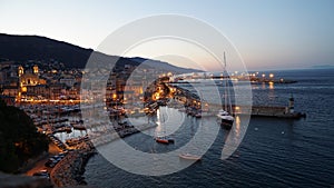 The old port city of Bastia at night on the french island of Corsica.