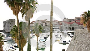 The old port harbor is porporela, near the walls of the old town of Dubrovnik, Croatia. The view from the entrance to