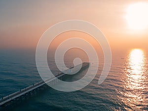 Old port pier in Pondicherry Rock Beach during the sunset