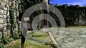 Old Post Box in Front of a Traditional house