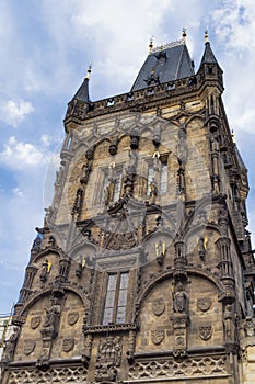 Old powder tower in Prague Czech republic and blue cloudy sky